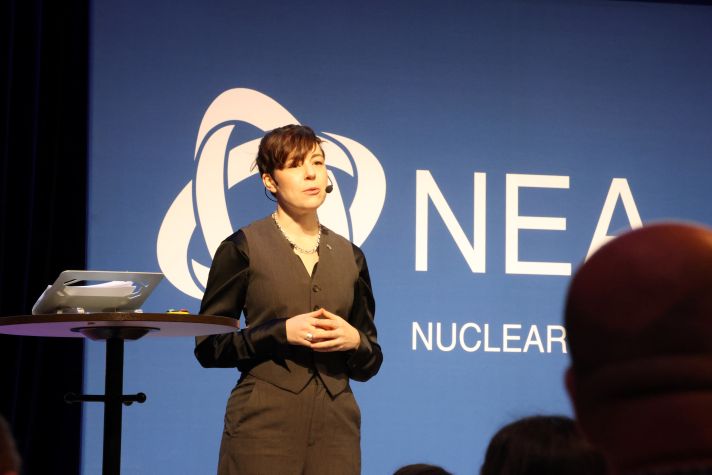 Close view of a woman holding a speech.