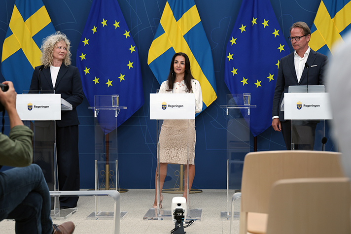 Parisa Liljestrand, Tone Hansen and Lars Strannegård in the press room.