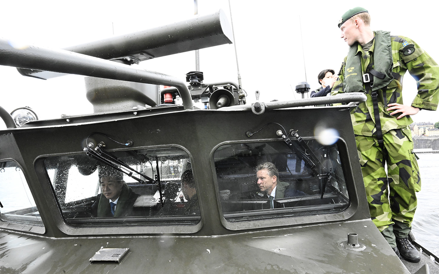 The two ministers sitting inside of the vessel.