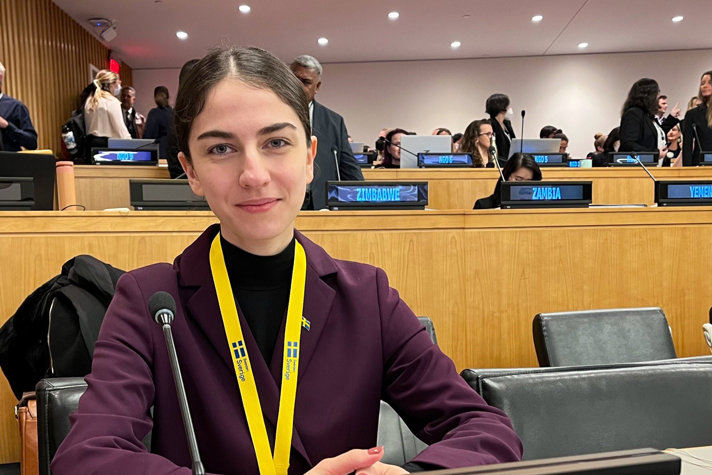 Romina Poumokhtari in a conference room