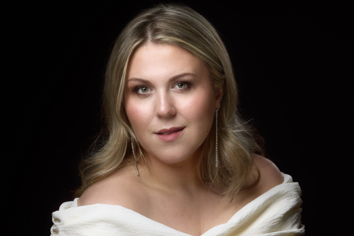 Christina Nilsson in a white shirt.